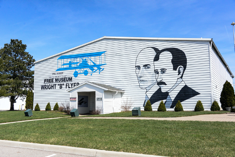 Wright Brothers painted on side of airplane hangar